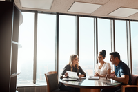 insurance agent meeting with couple