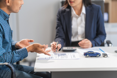 insurance agent explaining paperwork
