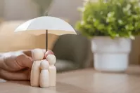 umbrella over family illustration of insurance protection