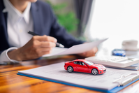 model car and insurance documents