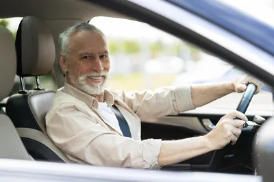 happy driver with insurance