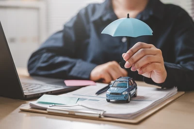 model vehicle under umbrella