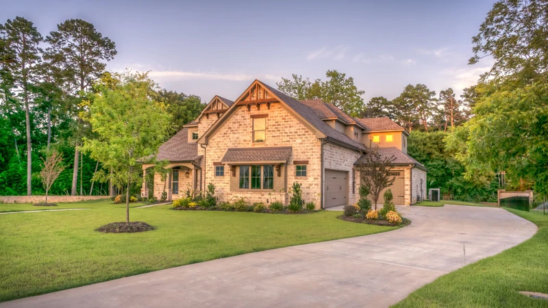 Photoreal 16:9 Tennessee brick home exterior with lawn and trees, no people, logos, or text